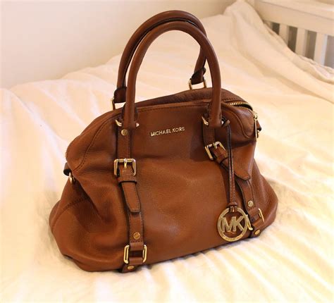 used michael kors purses|buy used michael kors purses.